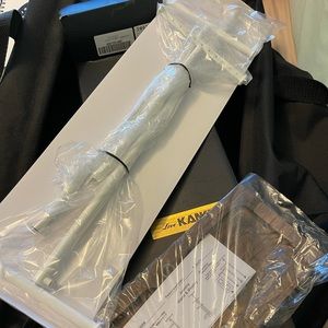 White jewelry stand with wooden base